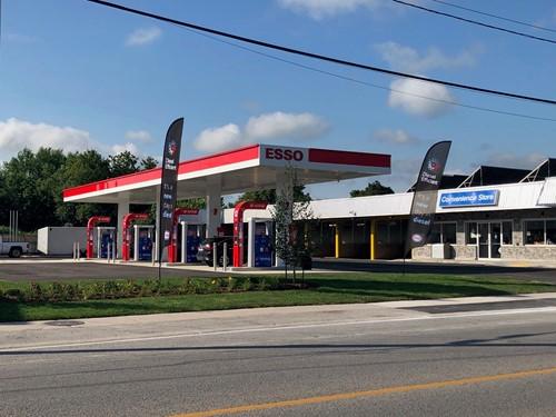 Shows exterior of Esso gas station